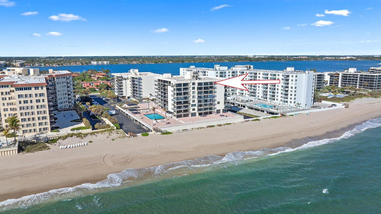 The Claridges aerial side view from the beach, with Intracoastal in background