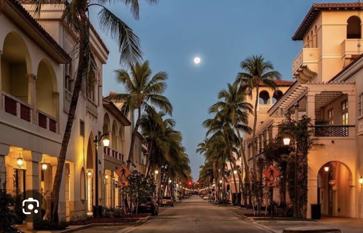 Worth Avenue at evening, palm-lined streets and historic Mediterranean architecture in Palm Beach